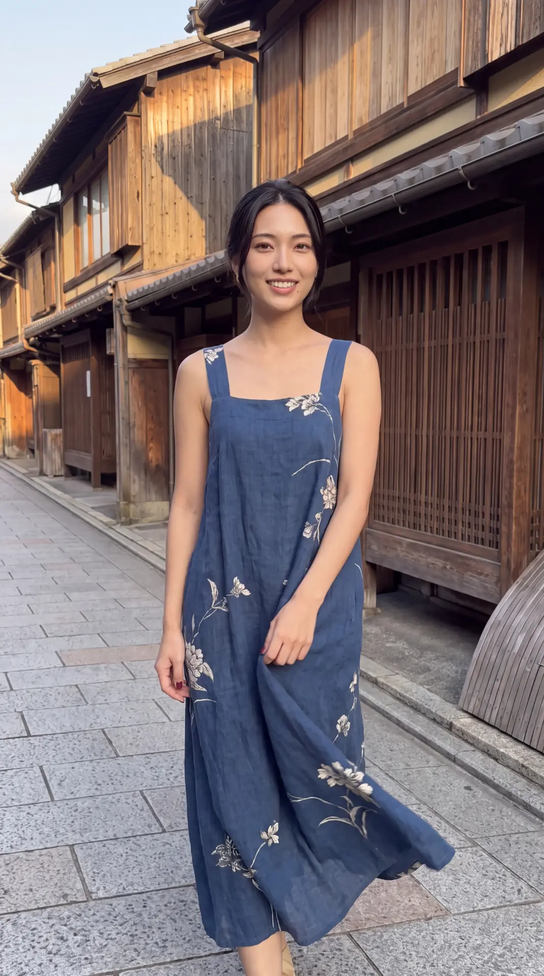 Nao walking a Kyoto street in a blue linen dress